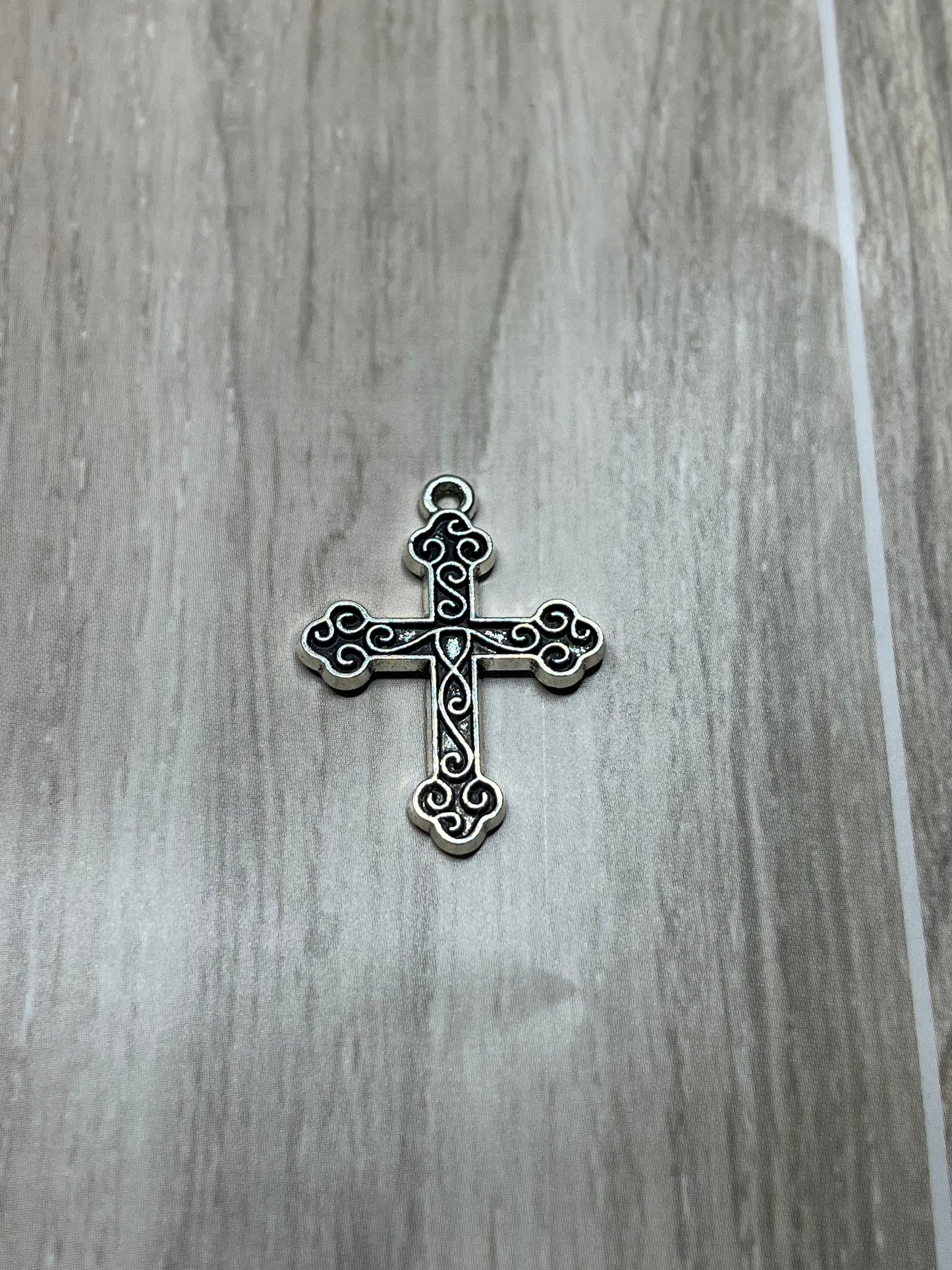 Sacred Scrolls Cross Charm