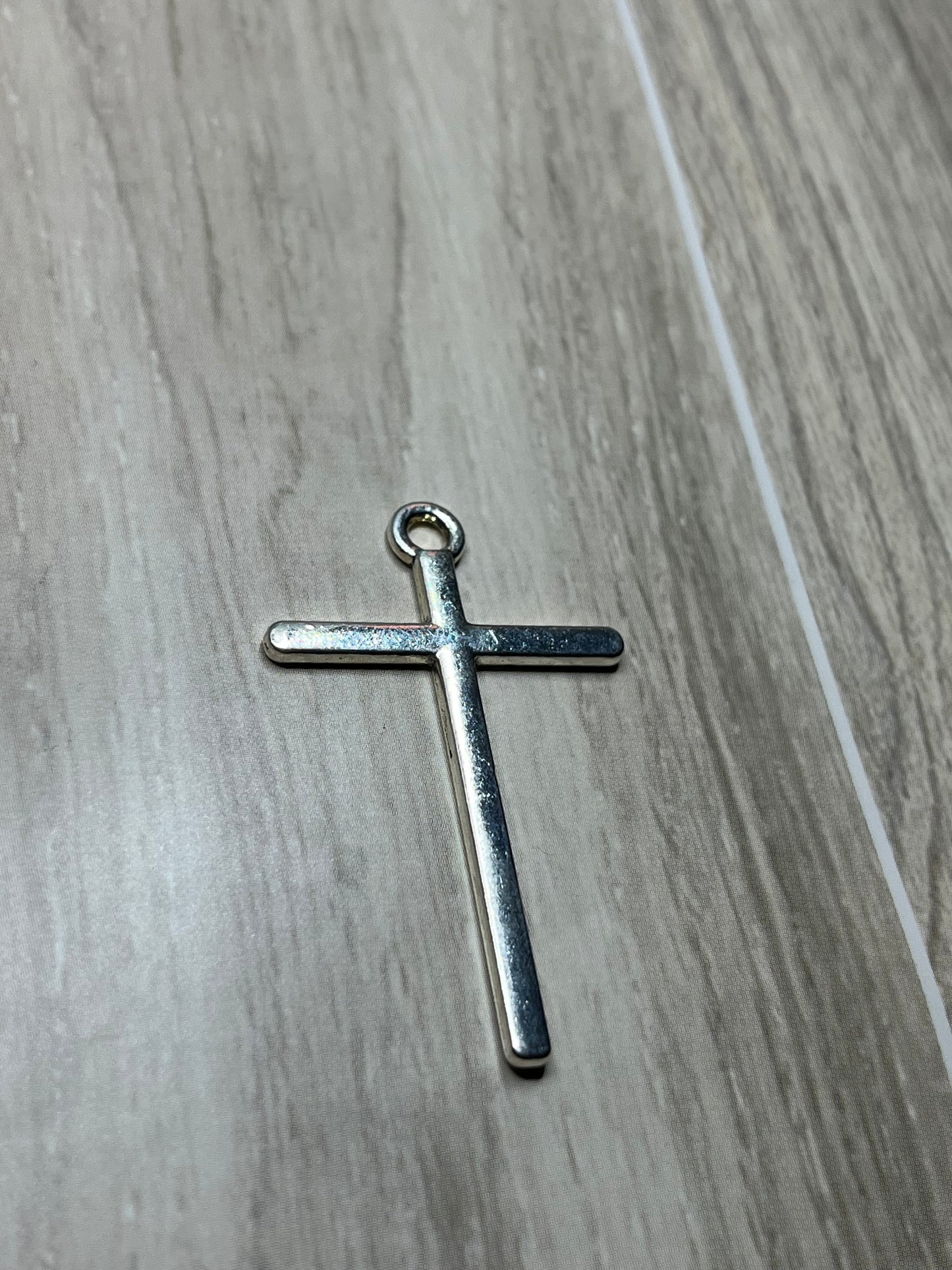 Redeemed and radiant Cross Charm