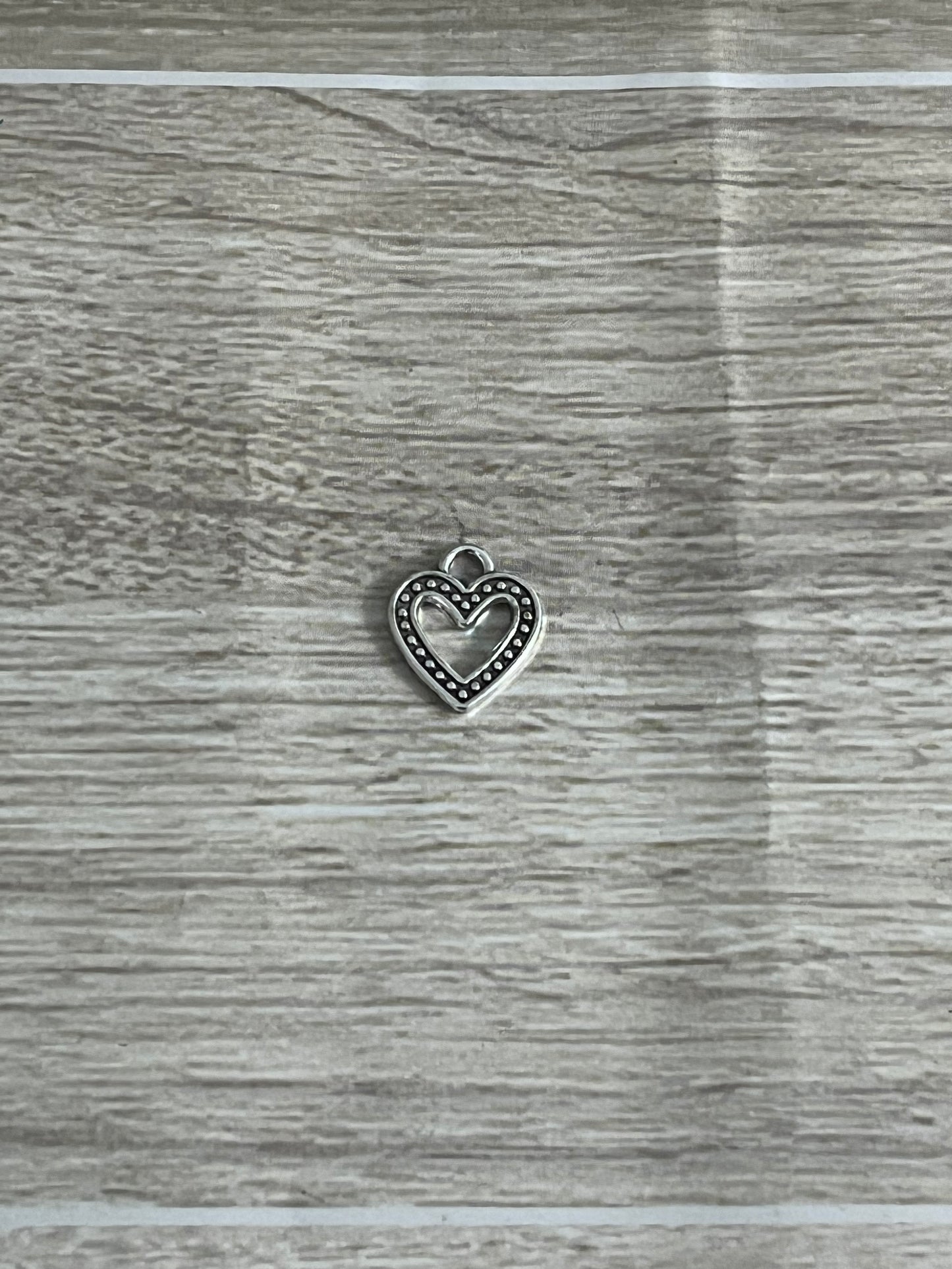 The Heart Remembers Heart Charm